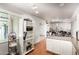 Bright kitchen area with view of exterior, featuring shelving at 6335 W Osborn Rd, Phoenix, AZ 85033