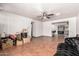 Open living space with tile flooring and a glimpse into adjoining areas at 6335 W Osborn Rd, Phoenix, AZ 85033