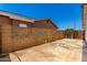 Concrete patio area enclosed by a block wall, ideal for outdoor relaxation and entertainment at 6335 W Osborn Rd, Phoenix, AZ 85033