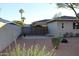 Low-maintenance backyard with a shed, desert landscaping, and a block fence for added privacy at 6702 E Almeria Rd, Scottsdale, AZ 85257