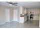 Modern, open-concept kitchen with stainless steel appliances and a seamless transition to the living area at 6702 E Almeria Rd, Scottsdale, AZ 85257