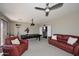 Entertaining game room featuring a pool table and comfortable couches at 6937 W Jackrabbit Ln, Peoria, AZ 85383