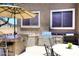 Outdoor kitchen featuring a built-in grill and bar, perfect for outdoor entertaining at 6937 W Jackrabbit Ln, Peoria, AZ 85383
