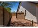 Backyard with gravel and desert landscaping including cacti and yucca plants at 723 E Piute Ave, Phoenix, AZ 85024