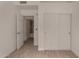 Bedroom showcases closet and wood-look tile flooring at 723 E Piute Ave, Phoenix, AZ 85024