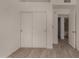 Bedroom showcases closet and wood-look tile flooring at 723 E Piute Ave, Phoenix, AZ 85024