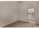 Bedroom with modern ceiling fan and wood-look tile flooring at 723 E Piute Ave, Phoenix, AZ 85024
