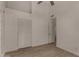 Bedroom showcases high ceilings and wood-look tile flooring at 723 E Piute Ave, Phoenix, AZ 85024