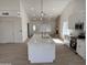 Bright, newly updated kitchen with large island, modern appliances, and plenty of natural light at 723 E Piute Ave, Phoenix, AZ 85024