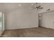 Spacious living room with neutral walls, tile floors, recessed lighting and modern ceiling fan at 723 E Piute Ave, Phoenix, AZ 85024
