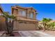 Charming two-story home with desert landscaping, and a two car garage at 7724 W Oraibi Dr, Glendale, AZ 85308