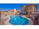 Enjoy outdoor living with a beautiful pool and patio, perfect for entertaining friends and Gathering at 7724 W Oraibi Dr, Glendale, AZ 85308