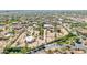 Spacious property with desert landscaping, multiple buildings, a pool, and mature trees at 8043 E Laurel St, Mesa, AZ 85207