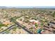 Expansive desert property boasts a large lot with multiple buildings, a pool, and plenty of open space at 8043 E Laurel St, Mesa, AZ 85207