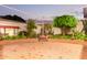 Wide open backyard space with manicured landscaping and tile patio, perfect for outdoor activities and entertaining at 8043 E Laurel St, Mesa, AZ 85207