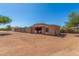 Exterior view of a well-maintained barn on a spacious lot with mature trees at 8043 E Laurel St, Mesa, AZ 85207