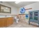 Pool bathroom offers practical features like a sink, vanity, and cabinet at 8043 E Laurel St, Mesa, AZ 85207