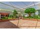 Private courtyard with brick accents and lush landscaping, perfect for relaxation and outdoor enjoyment at 8043 E Laurel St, Mesa, AZ 85207