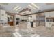 Spacious kitchen with granite countertops, an island, and stainless steel appliances at 8043 E Laurel St, Mesa, AZ 85207