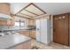 Functional kitchen with appliances, ample storage, and natural light for easy meal preparation at 8043 E Laurel St, Mesa, AZ 85207