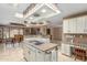 Open kitchen with granite counters and breakfast bar at 8043 E Laurel St, Mesa, AZ 85207