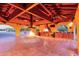 Full outdoor kitchen with gas grill and fire pit with a spectacular vaulted ceiling at 8043 E Laurel St, Mesa, AZ 85207