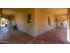 Expansive covered patio with classic Saltillo tile providing a comfortable outdoor living space at 8043 E Laurel St, Mesa, AZ 85207