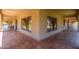 Spacious covered patio featuring Saltillo tile flooring and views of the landscaped yard at 8043 E Laurel St, Mesa, AZ 85207
