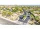 Community street entrance featuring desert landscaping and decorative stone walls near community signs at 8043 E Laurel St, Mesa, AZ 85207