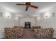 Home theater featuring multiple seats and large television at 8043 E Laurel St, Mesa, AZ 85207
