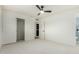 Bedroom featuring carpet, ceiling fan, and closet with sliding doors at 8252 E Heatherbrae Ave, Scottsdale, AZ 85251