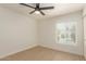 Bedroom with a ceiling fan and a window offering a glimpse of the pool at 862 W Javelina Ave, Mesa, AZ 85210