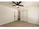 Bedroom featuring a modern ceiling fan, closet, and ensuite bathroom at 862 W Javelina Ave, Mesa, AZ 85210