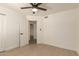 Bedroom features modern ceiling fan, spacious closet, and ensuite bathroom at 862 W Javelina Ave, Mesa, AZ 85210