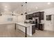 Open concept kitchen with a large island, stainless steel appliances, and eat in space at 862 W Javelina Ave, Mesa, AZ 85210