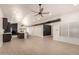 Open-concept living space showcasing wood floors, updated lighting and a large center area at 862 W Javelina Ave, Mesa, AZ 85210