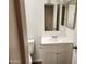 Neat bathroom featuring a toilet, updated vanity and sink, with a well-lit mirror at 8940 W Olive Ave # 39, Peoria, AZ 85345