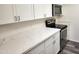Bright kitchen with white cabinets, modern appliances, and beautiful countertops at 8940 W Olive Ave # 39, Peoria, AZ 85345