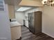 Contemporary kitchen with stainless steel refrigerator, stylish cabinets, and lots of counter space at 8940 W Olive Ave # 39, Peoria, AZ 85345