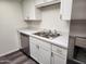 Well-equipped kitchen featuring stainless steel appliances, a double sink, and ample storage at 8940 W Olive Ave # 39, Peoria, AZ 85345