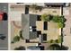 Aerial view of the property showcasing the roof, landscaping, and surrounding neighborhood at 10910 N 72Nd Dr, Peoria, AZ 85345