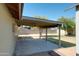 Outdoor covered patio area overlooking backyard, great for relaxing and enjoying fresh air at 10910 N 72Nd Dr, Peoria, AZ 85345