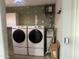 Laundry room equipped with new Samsung washer and dryer units for modern convenience at 10910 N 72Nd Dr, Peoria, AZ 85345