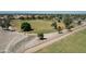 An aerial view showcases a well-maintained neighborhood park with lush greenery and recreational areas at 10910 N 72Nd Dr, Peoria, AZ 85345