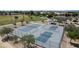 An aerial view highlights newly surfaced pickleball courts in a park setting, promoting active lifestyles at 10910 N 72Nd Dr, Peoria, AZ 85345
