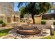Community fountain set within a landscaped courtyard, perfect for relaxation and outdoor enjoyment at 11026 N 28Th Dr # 81, Phoenix, AZ 85029