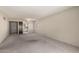 Inviting living room with access to the kitchen and a large window for natural light at 11026 N 28Th Dr # 81, Phoenix, AZ 85029
