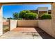 Private patio with brick and concrete flooring, enclosed by a wall with a view of the complex at 11026 N 28Th Dr # 81, Phoenix, AZ 85029