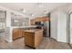 Efficient kitchen with stainless steel appliances and ample counter space, ideal for culinary enthusiasts at 11871 W Sherman St, Avondale, AZ 85323