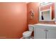 Powder room with a modern vanity, mirror and neutral-toned walls at 1222 W Baseline Rd # 119, Tempe, AZ 85283